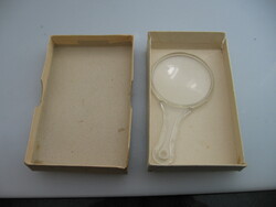 Old magnifying glass with old box