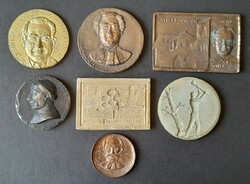 7 cast medals, plaques, designs, plaster samples