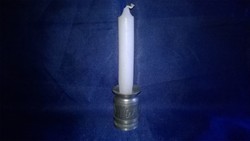 Embossed, marked tin candle holder