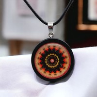 Necklace with glass lens pendant