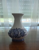 Small ceramic vase with blue flowers