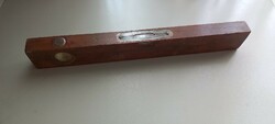 Peaceful working wooden spirit level with iron and glass parts