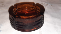 Thick-walled, heavy amber glass ashtray