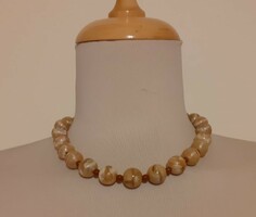 Necklace made of satin glass