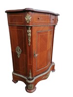 Inlaid chest of drawers with copper applications