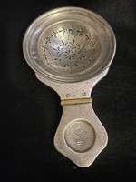 Silver antique tea strainer 105 grams.