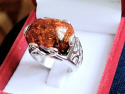 Solid women's silver ring with amber