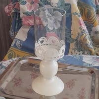 Candle holder with glass cover.