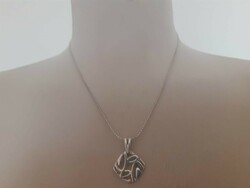 Showy silver necklace with pendant