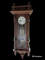 2 heavy German cast iron wall clocks