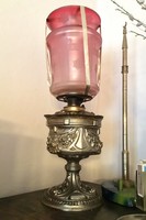 Kerosene lamp with a special metal body and etched glass cover