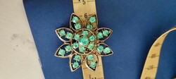Brooch is a beautiful and showy piece in turquoise color