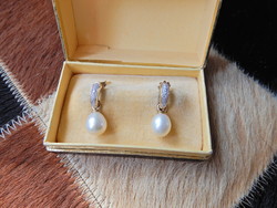 14K gold earrings with a pair of diamonds and freshwater pearls