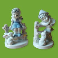Porcelain girl and boy figures in pairs