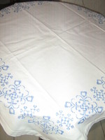 Tablecloth embroidered with beautiful blue cross-eyes