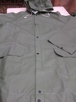 Army green raincoat never gets wet, never falls apart