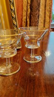 2 old glass cocktail glasses.
