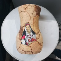 Tile vase with cork cover.