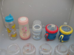 Plastic baby bottles, glasses, mugs with beaks