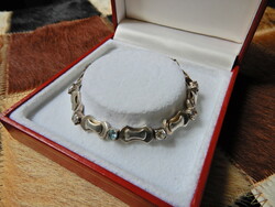 Old silver bracelet with sparkling stones