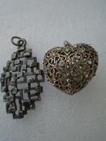 2 old pendants, one is a Swedish craftsman pendant and the other is an openwork heart pendant