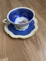 Beautiful collector's porcelain tea cup with saucer.