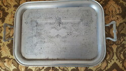 Engraved metal serving tray from the beginning of the last century