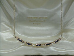 Gold necklace with blue sapphires and brilles