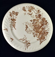 Antique Belgian faience plate with decorative bird decor