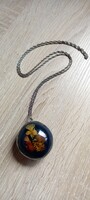 Old Polish pendant with pressed flowers