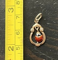 Golden ladybug pendant