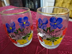 Two glass brandy cups with a hand-painted floral pattern. He has!
