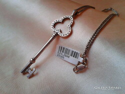 Silver necklace with key pendant, zirconia stones.