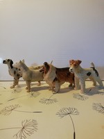 4 flawless bisquit porcelain dogs