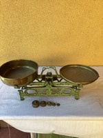 Antique copper plate kitchen scale with set of weights.