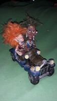 Retro fun humorous painted figure punks with oldsmobile bookend 14 x 16 x 8 cm according to the pictures