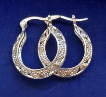 Silver plated hoop earrings.