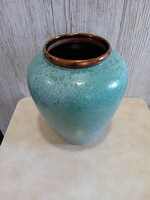 Ceramic vase in copper color
