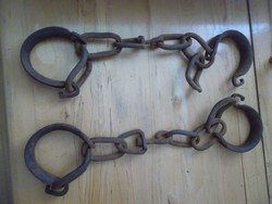 Antique wrought iron horse shackles in a pair
