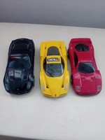 3 small Ferrari cars