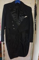 Old stitched men's tailcoat and waistcoat