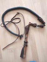 Old hoop whip with decorative frills