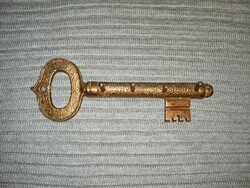 Metal keychain in the shape of a key