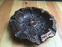 Old, decorative copper ashtray