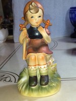 Beautiful goebel hummel girl on the stump from the 50s and 60s