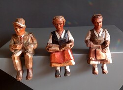 Sitting small carved figures can be negotiated for decorative purposes