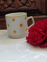 Zsolnay mug with yellow speckled skirt