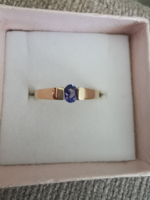 Gold ring with tanzanite stones