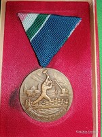 Old award for flood protection with bronze grade box as shown in the pictures