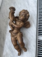 Baroque beautiful, meticulously carved putto candle holder.